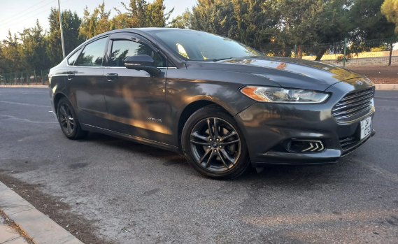 فورد فيوجن اس اي 2015 فحص 4 جيد لون فيراني بسعر مغري قابل للبدل